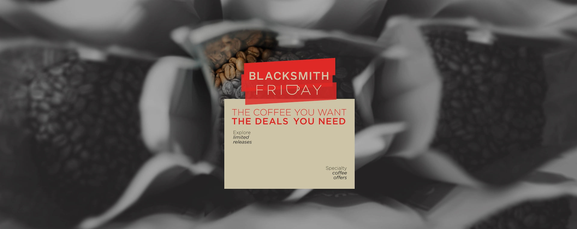 Blacksmith Coffee Company banner with specialty roasted coffee beans in open pouches.